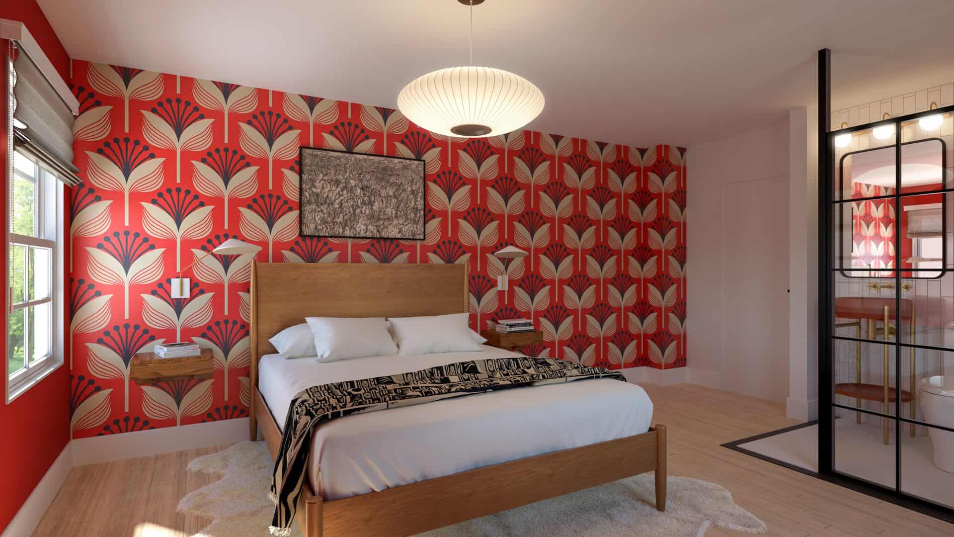 The Oppenheimer Room at Assemble Boise with bold red patterned wallpaper, queen bed, modern lighting, and ensuite bathroom