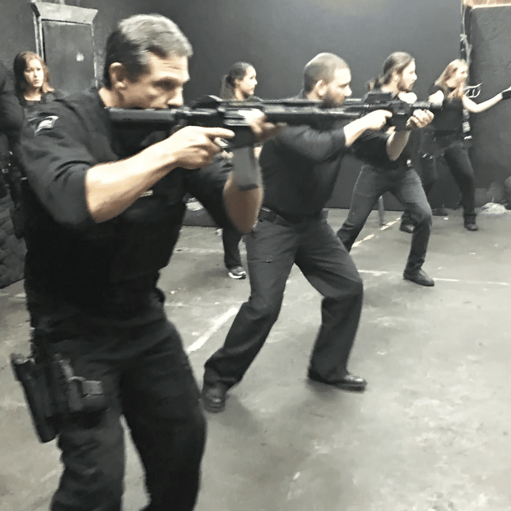 Tactical Training in Boise: Armed security team assembling rifles during training exercise. Professional tactical skills.