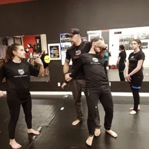 Tactical Training: Krav Maga Experts in Boise demonstrate self-defense techniques during an assemble training session.